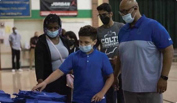 a group of people wearing masks