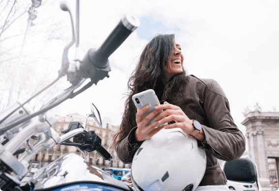 a woman holding a phone