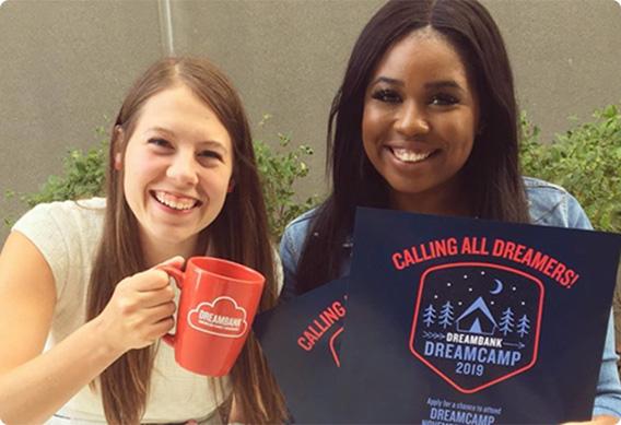 two girls holding a red cup