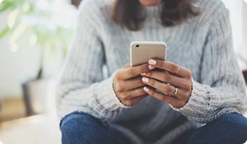 a woman using a phone