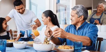 Family having at a dinner table