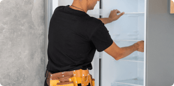 a man installing shelves