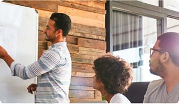 a man talking to a group of people