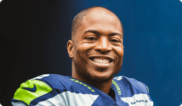 Tyler Lockett smiling for the camera