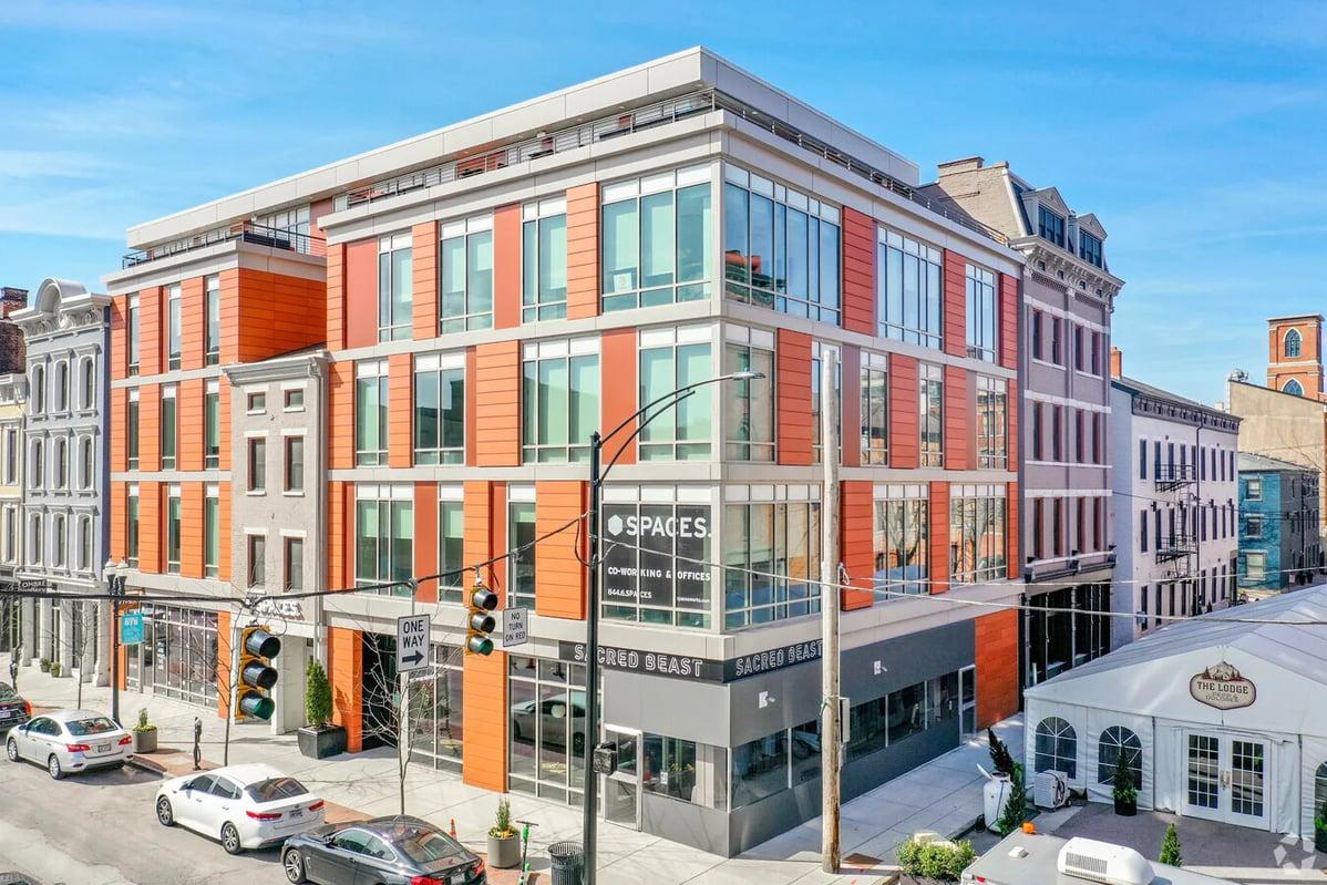 a multi-story building with a street in front