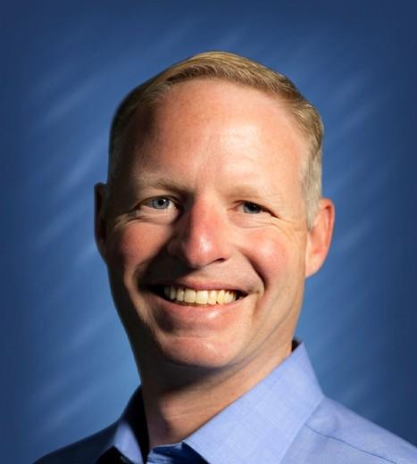 a close-up of a man smiling