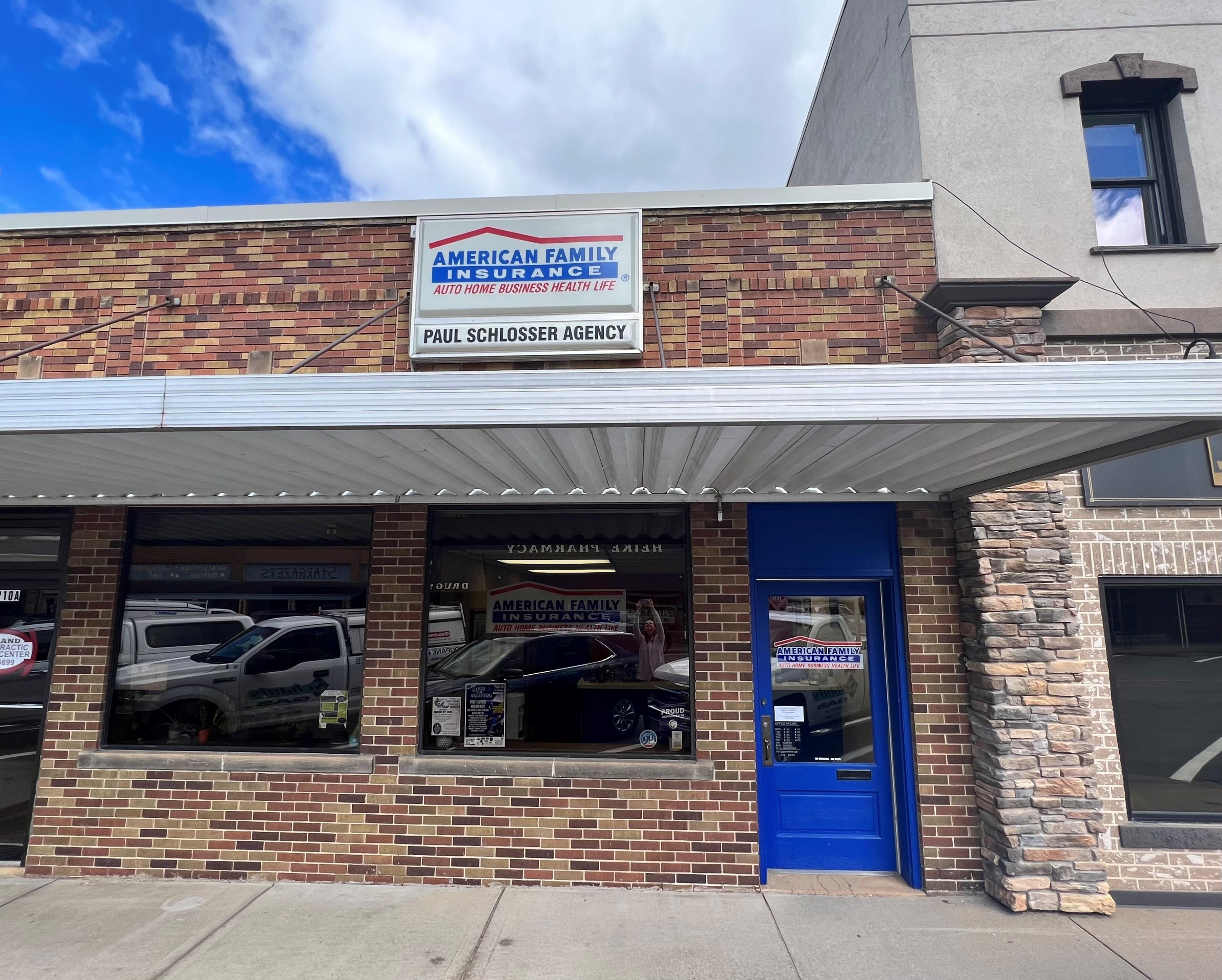 a store front with a blue door