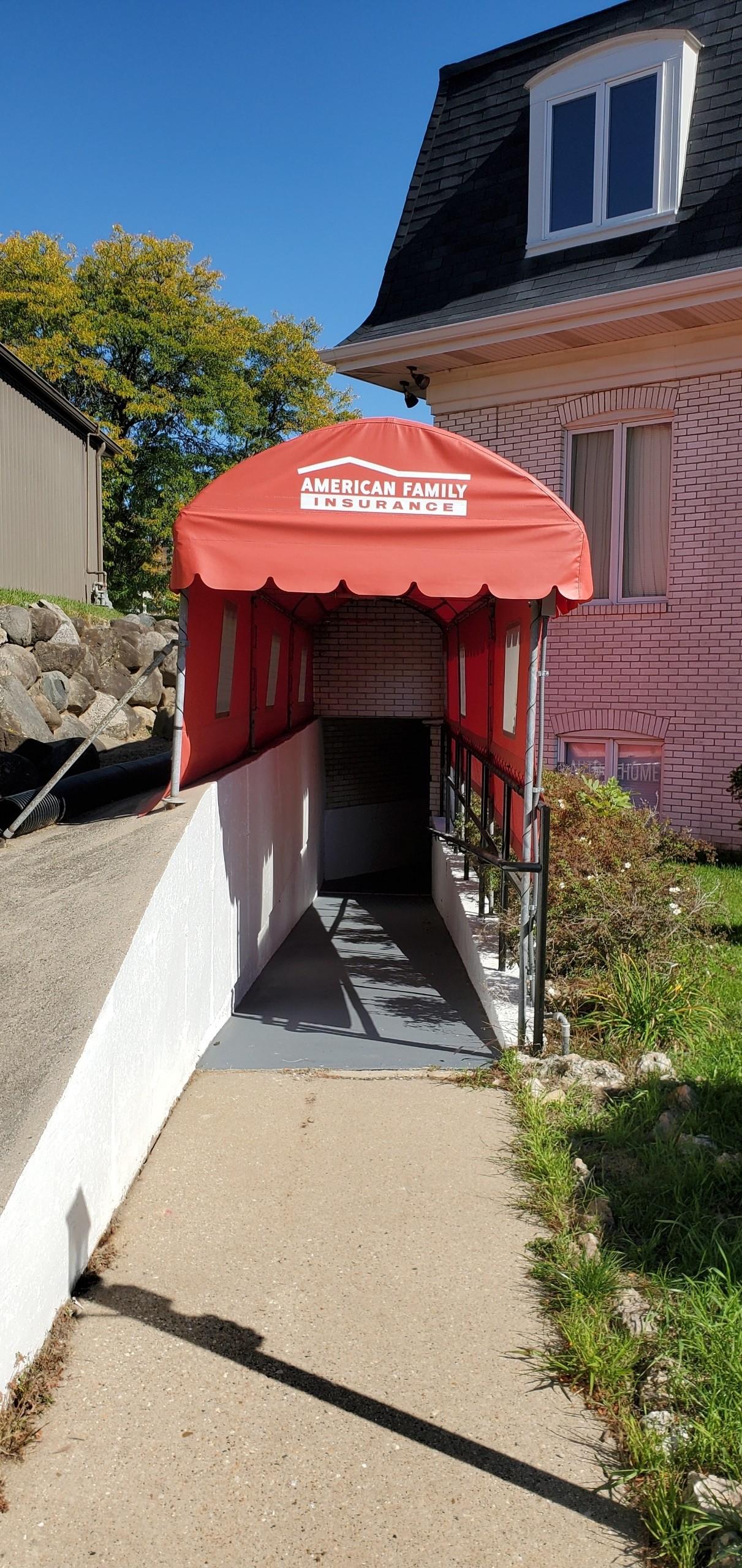 a red building with a sign