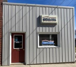 a building with a sign on the door