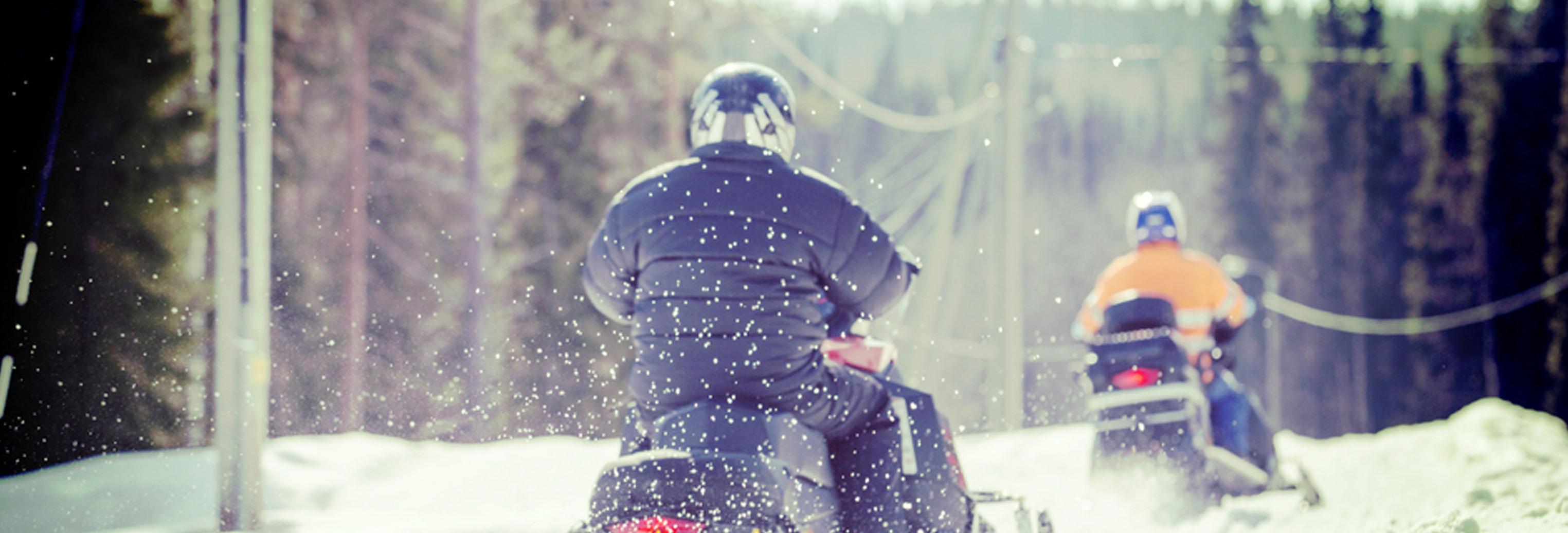 snowmobile riders