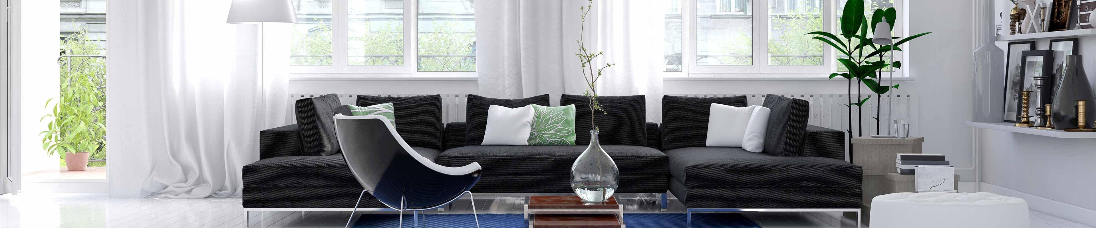 Image of a living room with sound coming in through an open patio door.