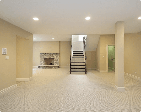 Clean basement with staircase leading upstairs