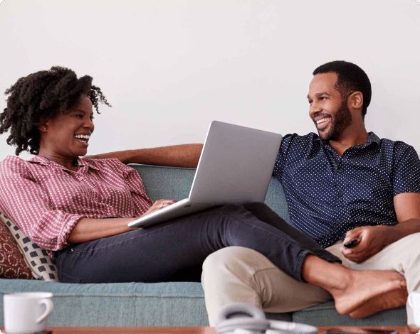 a couple relaxing on a couch