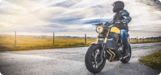 a man riding a motorcycle