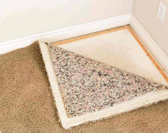 carpet and padding being removed from floor