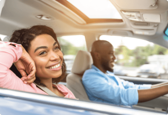 a man and woman in a car