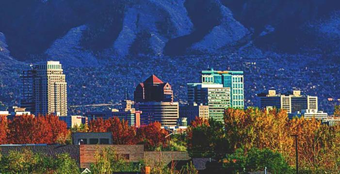 a city with mountains in the background